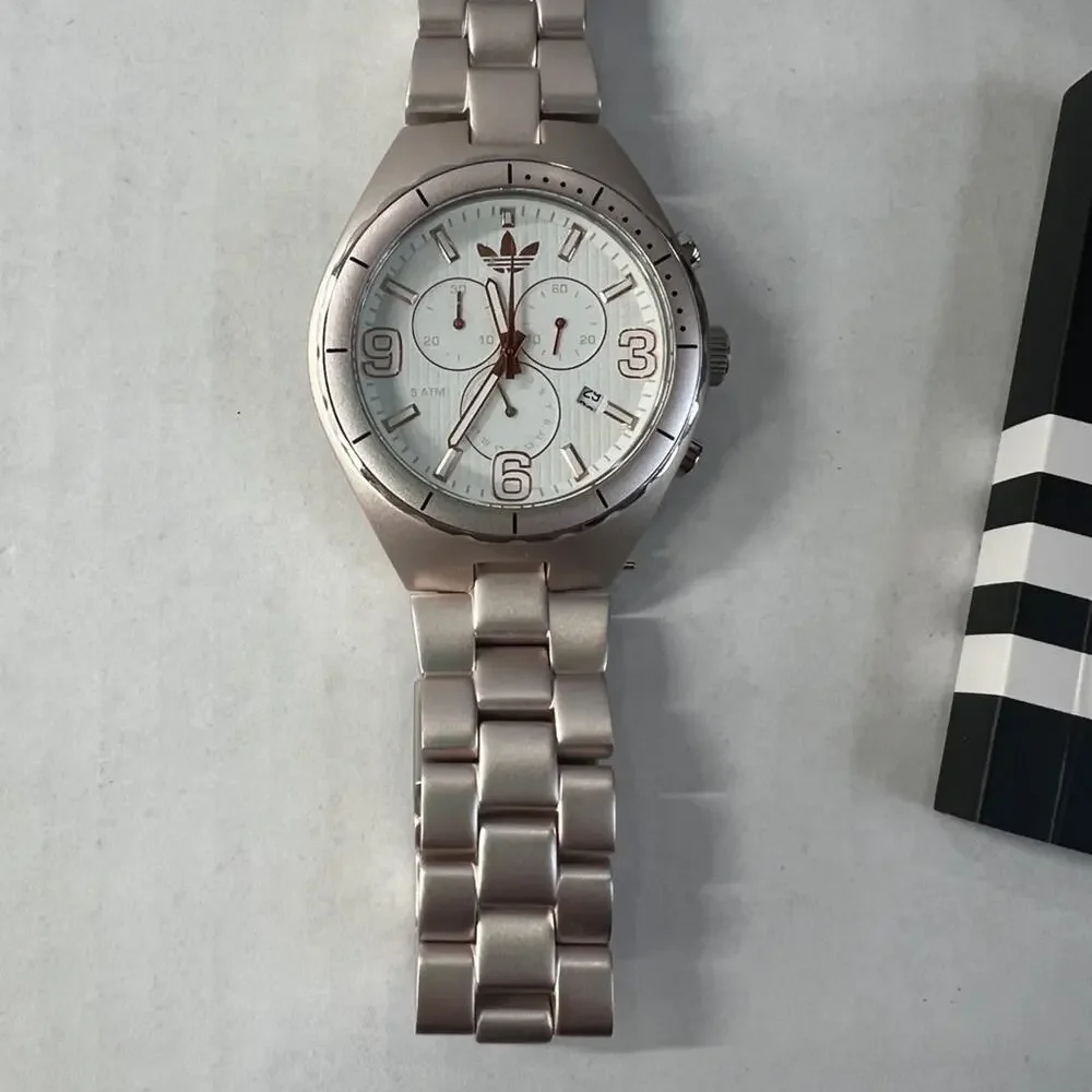 Adidas Metallic rose gold tone Watch with White and gold dial